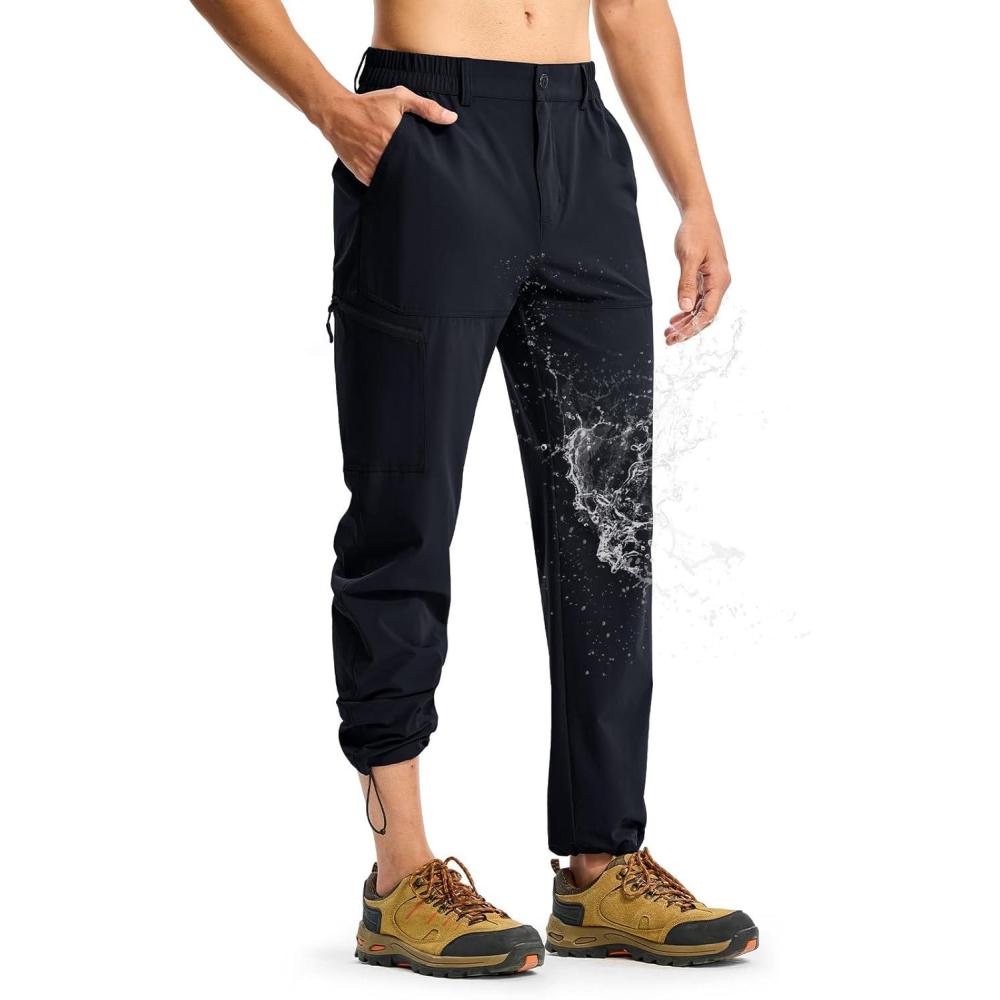 imageTBMPOY Mens Lightweight Hiking Pants Quick Dry 4 Pockets Stretch Water Resistant Travel Fishing Convertible Zip Cargo JoggerNavy