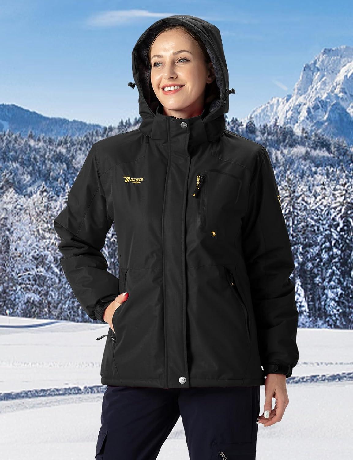 imageTBMPOY Womens Waterproof Ski Snow Jackets Warm Winter Coats Fleece Lined Hooded Rain Windbreaker Jacket for Snowboarding